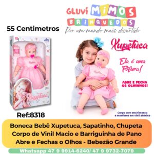 Boneca Bebê Xupetuca, Sapatinho, Chupeta  Corpo de Vinil Macio e Barriguinha de Pano Abre e Fechas o Olhos - Bebezão Grande